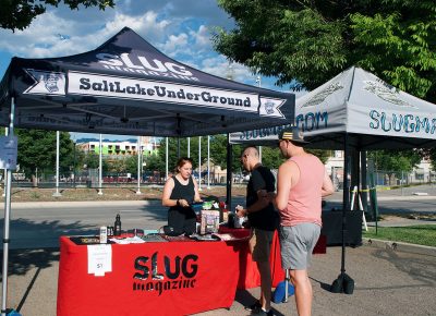 Attendees sign up for the SLUG Picnic raffle for a chance to get exciting gifts from the event's sponsors.