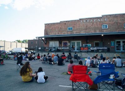 The crowd anxiously awaits the night's music.