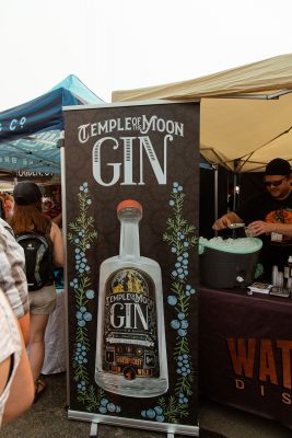 A floral advertisment for Waterpocket Distillery's Temple of the Moon Gin.