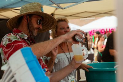 SaltFire Brewing pouring out a sample of their beer.