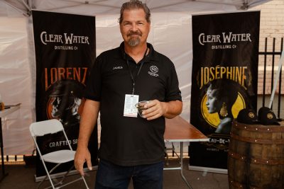 James from Clear Water Distillery with some fine spirits and a finer goatee.