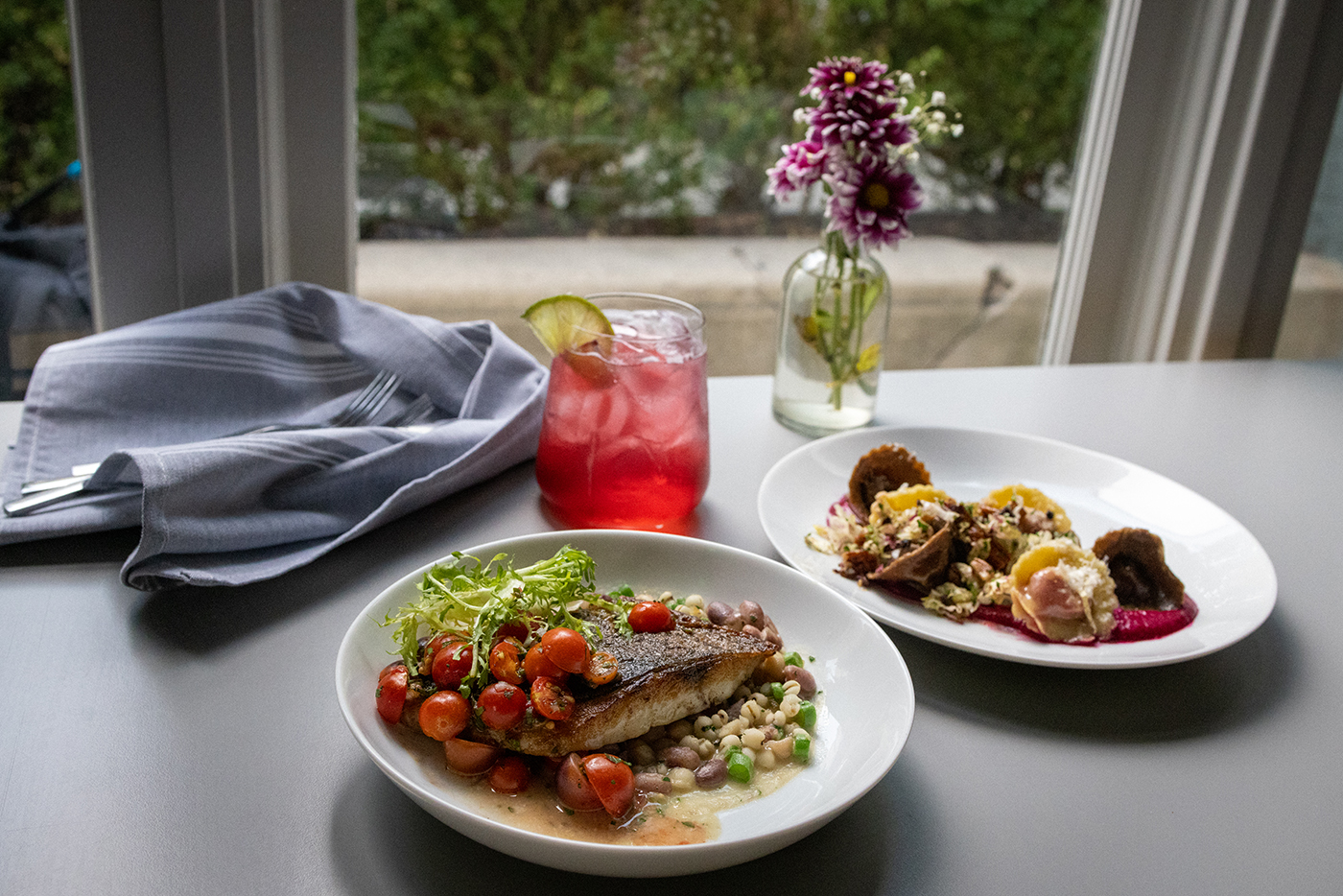 (L–R) Arlo’s Sea Bass, Spritzer and Ravioli carry complementary elements that make for successful entrée pairings.