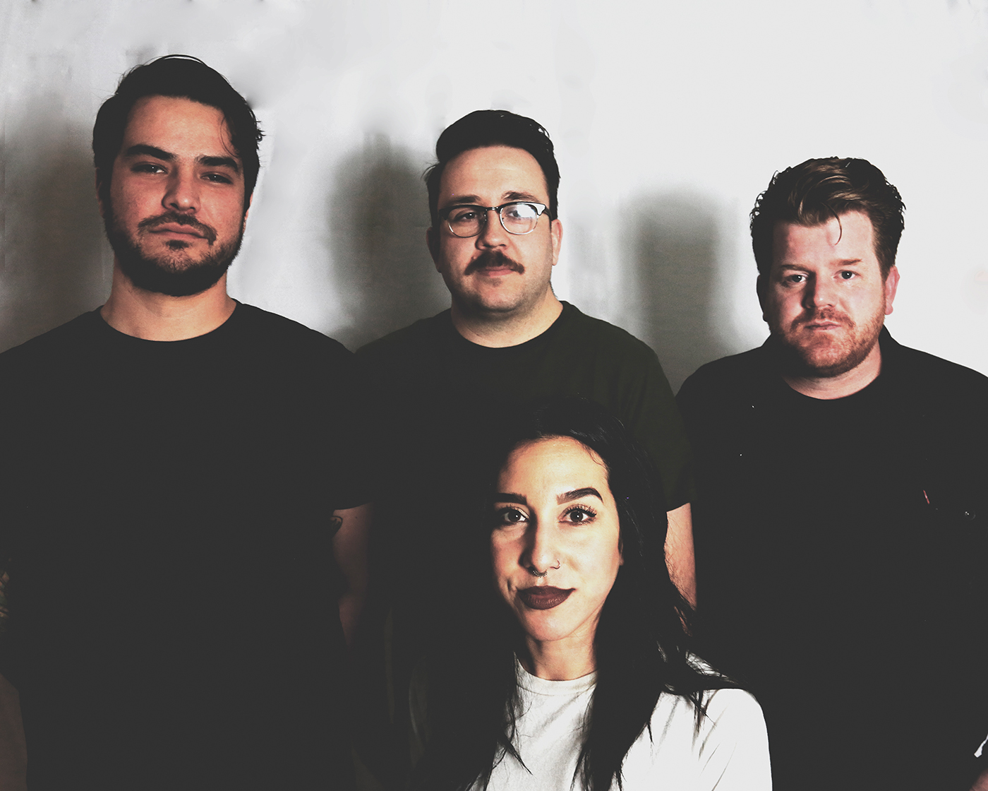 (Clockwise from left) City Ghost members Matt Mascarenas, Ken Vallejos, Chase Griffis and Sadie O’Neill merge their unique musical pasts together for their own, identifiable noise.