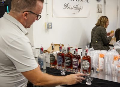 Francis Fecteau gets sample glasses ready for pouring..