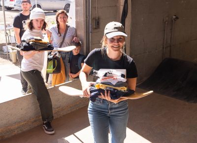 Michelle and Kallie bringing in the prizes.