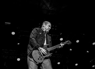 Punk legend Lars Fredrickson on guitar.