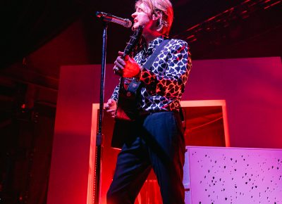 FINNEAS working the guitar on stage in SLC for a sold-out show.