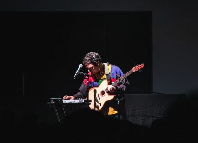 Marinelli keeps on the guitar but takes to the keys for a few songs while on stage in SLC.