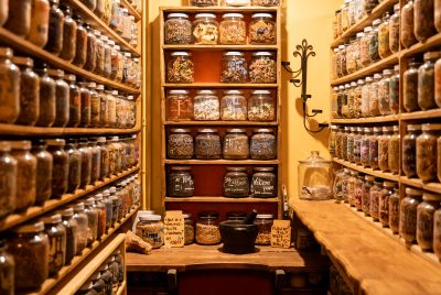 The walls of Natural Law Apothecary are lined—floor-to-ceiling—with jars of homemade remedies and tinctures.