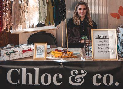 Chloe from Chloe & Co. Studio looks on as she contemplates her next rad piece.