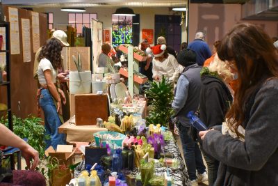 2021 Holiday Market patrons browsing various vendors.