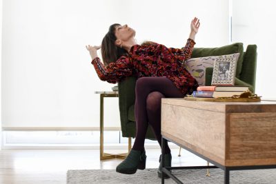 "I always wear a good pair of earrings and tuck in my tops. For me, this seems to tie everything together," says Heller.