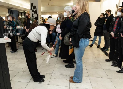 Sandra Lee blesses people with sage.