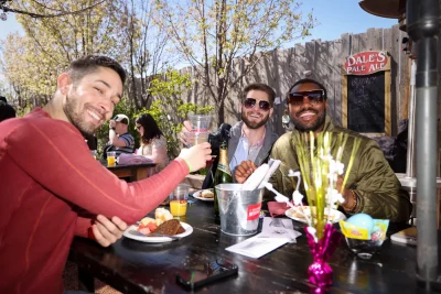 (L-R) Adrien, Devon and Max raise their mimosas.