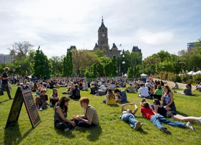 Kilby Block Party 3 attendees laying on the grass