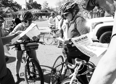 SLUG Cat participants on bikes.