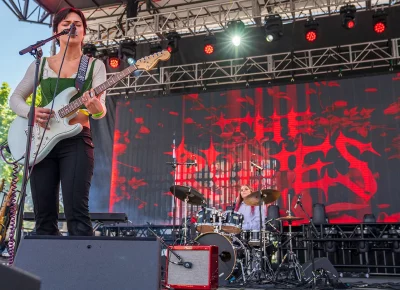 Aubrey Auclair (front left) and Esther Olsen (back right) brought remarkable energy through vocals, rifts, and beats.