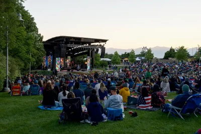 She & Him concert goers enjoying the start of the show.