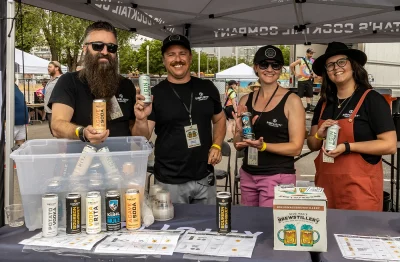 The Simplicity Cocktail Crew holding up their favorite selections of the day.