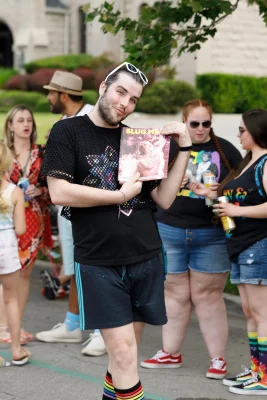 Fan of SLUG Mag posing with the magazine