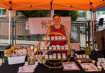 Valerie with the Curvy Spoon poses with some of her fine wares.