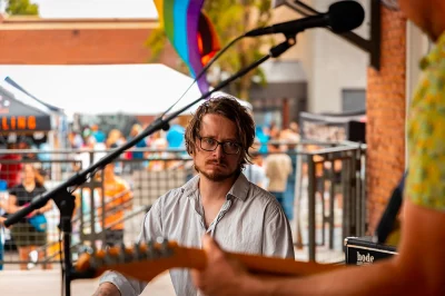 A member of The Will Baxter Band is entranced as he lets the music take over.