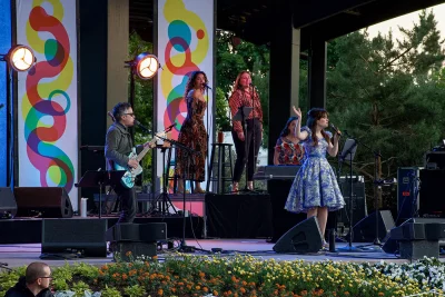 Deschanel performing vocals during the She & Him tribute show to Brian Wilson.