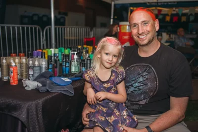 The hair coloring station in the kid’s area offered new looks for all ages. Here the Neath’s get Father/Daughter temporary dye hairdos. (Photo: @clancycoop)