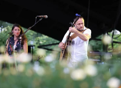 Ryan Montbleau playing guitar as seen from the front-row grass seats. (Photo: LmSorenson.net)