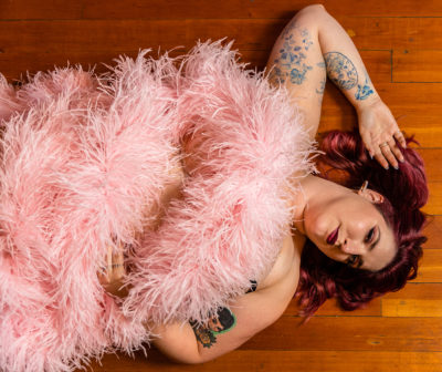 “[Burlesque] had been something I had been aware of, something I had gone to shows for, but it wasn’t something I could do, even though I was not super in the Church—just that shame is so prevalent,” Lark says.