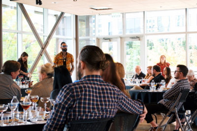 The crowd listens intently to the history of the Manhattan cocktail and how it has evolved over time. Photo: Lexi Kiedaisch