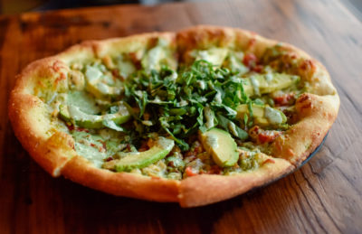 We wind down our feast with the California Sunrise ($14.75), a green goddess dressing–based pizza with roasted chicken, seasoned grape tomatoes, peppered bacon and the three-cheese blend.