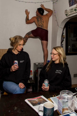 Madi Cooley and AJ Boyden carry on a normal conversation sporting Skiing Fucks' hoodies. (Photo: Jovvany Villalobos)