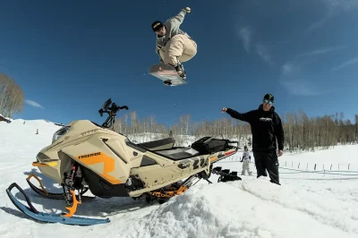 Chris Grenier jibbing a snowmobile next to the legendary Ken Block. Photo: E-Stone