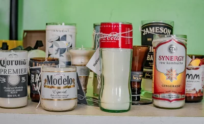 Candles on display from Tappan Candleworks, recycled from beer, kombucha and soda bottles.