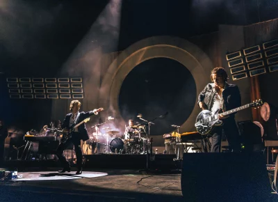 A full shot of Arctic Monkeys playing at the Delta Center