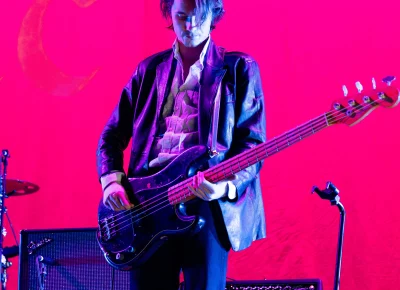 Bassist Conor Deegan performing.