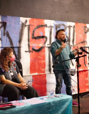 A performer during the open mic that captured the audience many times through laughter. Photo: Abel Cayas