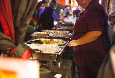 One of the members of Mark of the Beastro serving guests and making sure the food keeps coming. Photo: Abel Cayas