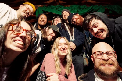 Bumpy Soup team members smile for the camera.