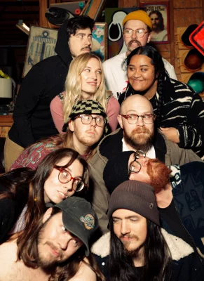 The Bumpy Soup team puts their heads together for a group portrait.