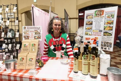 Grandma Sandino’s hands out samples at her booth. Photo: Moses Namkung