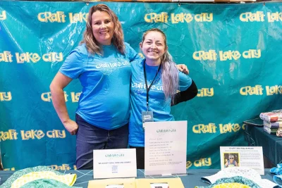 Two Craft Lake City volunteers pose for the camera.