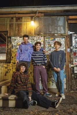 The members of Air Vent Dweller pose together outside of Kilby Court.