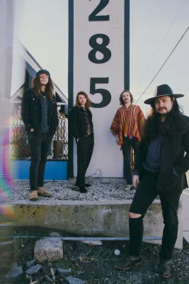 The Medicine Company stands staggered outside a sign.