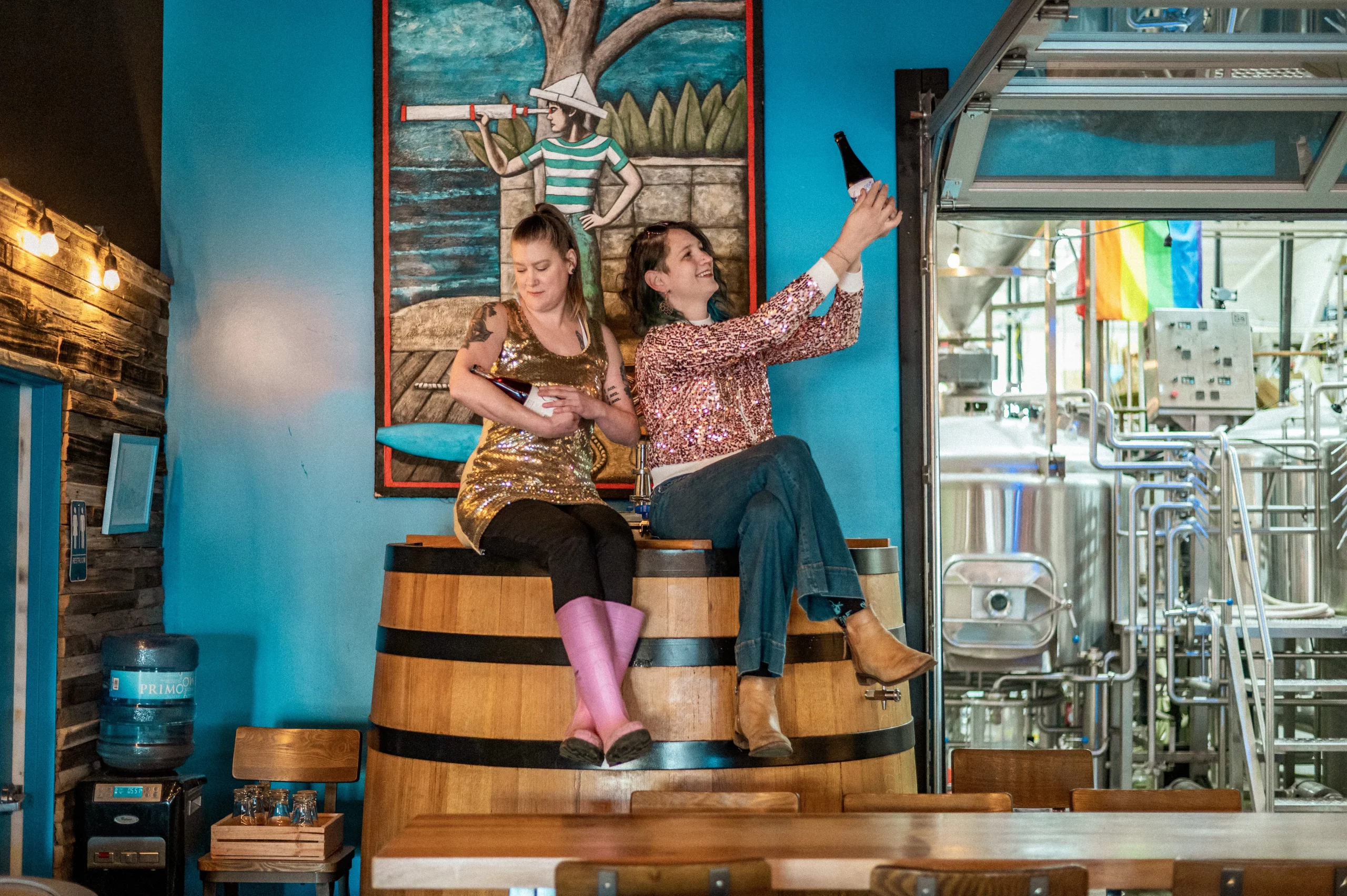 Jae Vanderwerf and Tanya Sapula pose on top of a barrel.
