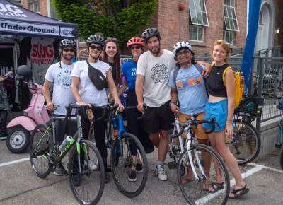 (L-R) Garrett, Andrea, Vanessa, Ana, Peter, Keshav and Julie are ready to complete their SLUG Cat manifests and earn some bonus points by playing games along the way. Photo: John Barkiple.