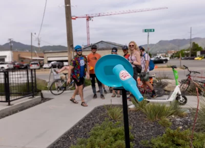 Grant knocks a bottle off the pedestal with a fake Frisbee™ and earn points toward his final SLUG Cat score. Photo: TaCara DeTevis.