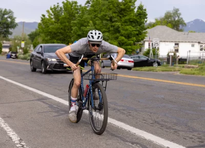 Cody drops into an aero glide en route to Culture Coffee on 300 North. Photo: TaCara DeTevis.