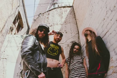 DoomCupcake band standing together.